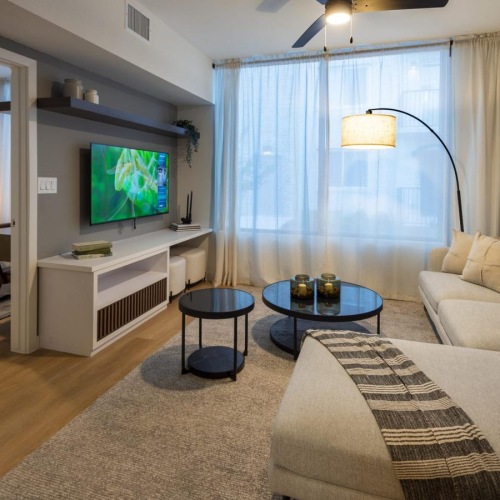 a living room with a large television