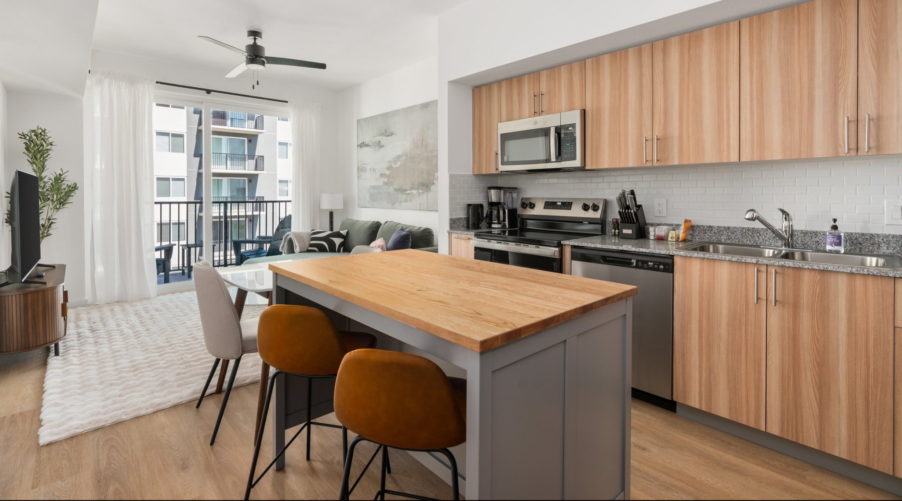 kitchen showing counterspace and bright lighting and modern appliances