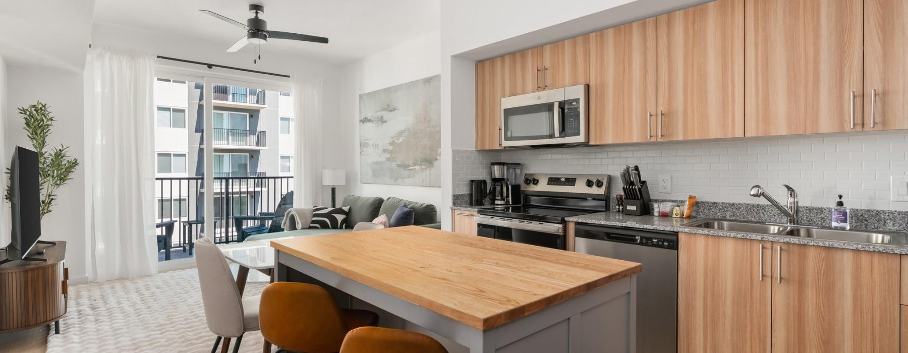 a kitchen with a table and chairs