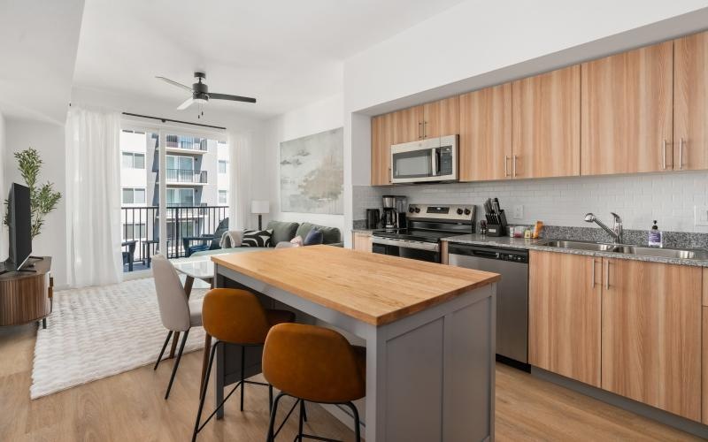 a kitchen with a table and chairs