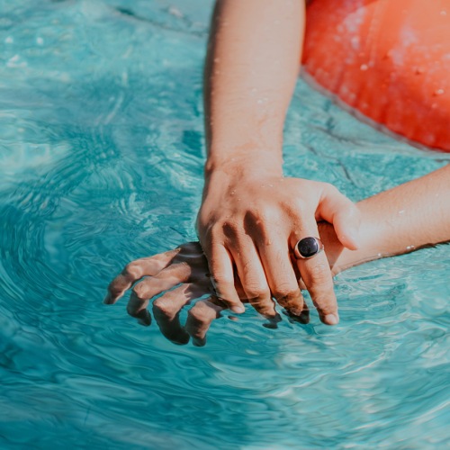 hands in water